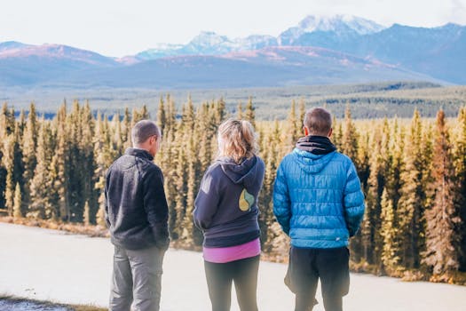 friends hiking together in the mountains