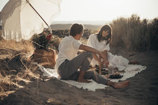 happy couple enjoying a picnic