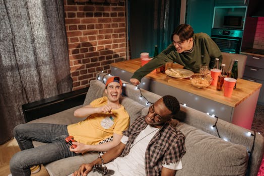 a group of friends laughing during a video call