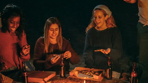 a group of friends sharing stories around a campfire